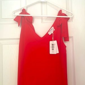 Red summer and dress up dress. New with tags, size M by SUD Express.